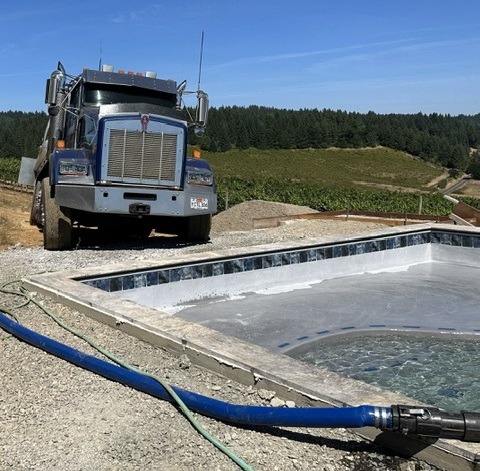No Drought tanker filling a residential swimming pool with potable water